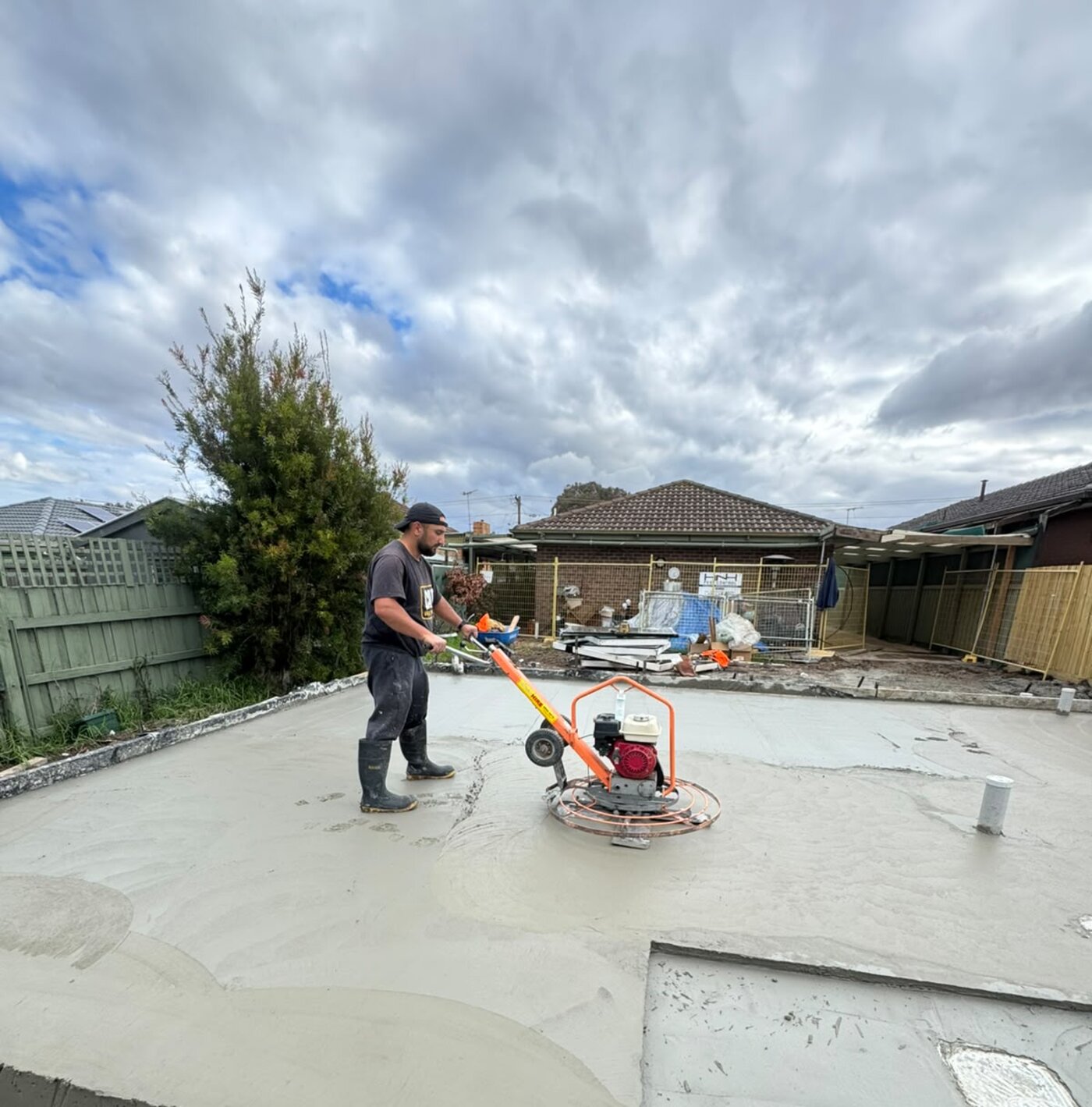Prime Concrete crew power trowelling a freshly poured slab